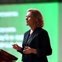 Dr. Elara Vance in a professional setting, demonstrating leadership.