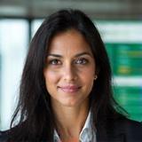 Portrait of Anya Sharma, Head of Operations at Caldera Flux, appearing organized and efficient.
